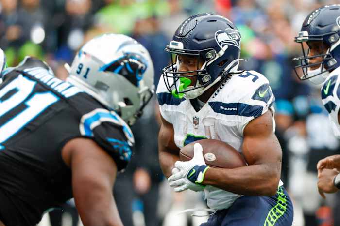 Seattle Seahawks running back Kenneth Walker III (9) rushes for a touchdown against the Carolina Panthers during the third quarter at Lumen Field.